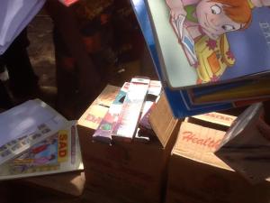 the items we distributed; exercise/textbooks,pens,pencils,drinks,biscuits